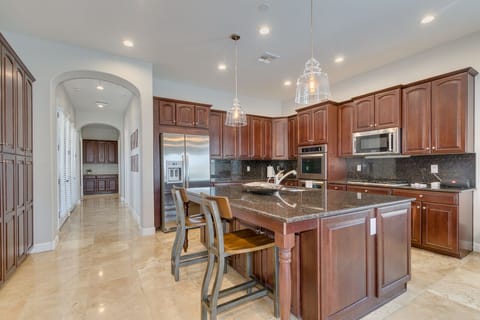 Kitchen with gas stove, double ovens, fully stocked with essentials