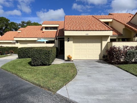 Front with garage and entrance