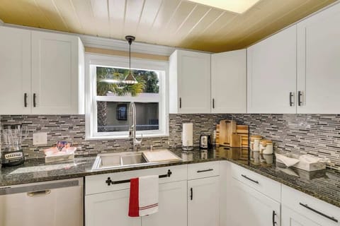 Beautifully clean & spacious kitchen with all new appliances! Stocked with everything you need for your stay & then some! Pots, pans, utensils, plates, bowls, wine glasses, coffee mugs, cups, blender, toaster, Keurig Duo k-cup & coffee maker & more!