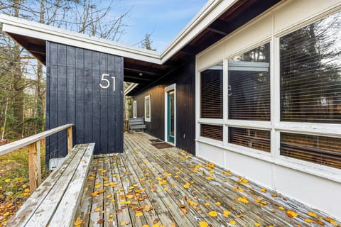 View of Front Door & Living Room picture window from the deck