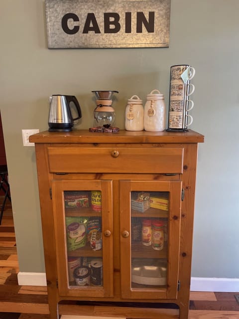 electric kettle, drip coffee maker and lots of flavorings/coffee/teas