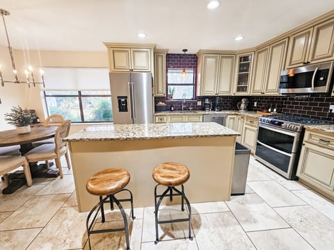 Gas range, double oven, Vitamix, coffee maker, Kitchen aid mixer and more. 