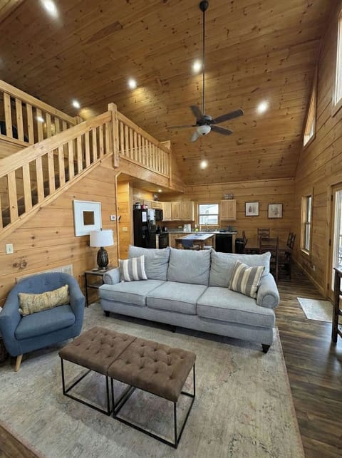 Living room with the Kitchen in the background creates family memories.