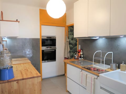 Cabinetry, Countertop, Property, Furniture, Sink, Building, Kitchen, Lighting, Kitchen Stove, Kitchen Sink