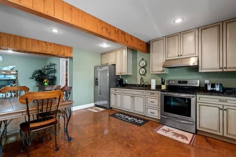 Basement Kitchen, fully equipped, also has own keurig with tea, coffee, and hot chocolate provided.