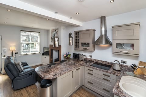 The kitchen has been recently fitted and contains everything that you need to cook dinner on your self catering holiday in Keswick