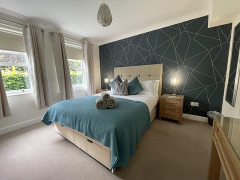 Master bedroom with king sized mattress