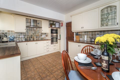 The spacious kitchen and dining area is perfect for a group of 4