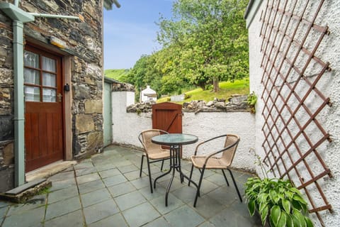 At the rear of the property is a lovely patio and seating area with access to the kitchen