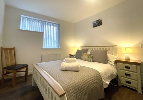 Have a restful sleep in the comfortable double bed at Sam's Cottage