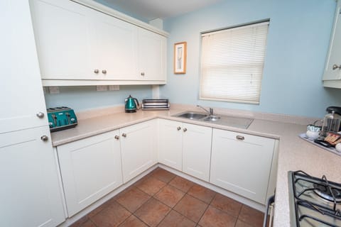 A well equipped kitchen has everything you need to cook dinner during your self catering holiday in Keswick
