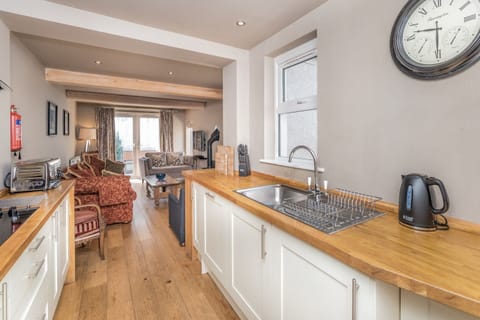 Essentials such as cutlery, utensils, cookware and appliances are paired with indulgent little extras such as an espresso machine