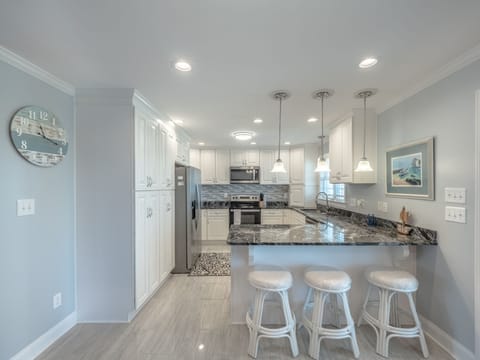 Kitchen and Bar - Seating for 3 at the bar