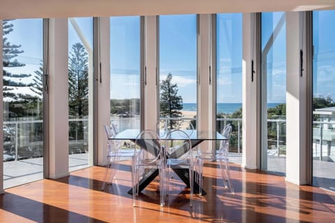 Floor to ceiling windows expose beautiful views of Currimundi Lake.