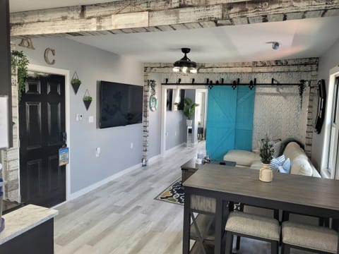 Open concept floor plan. Tv is not movable or on a swivel mount please do not attempt to move. 