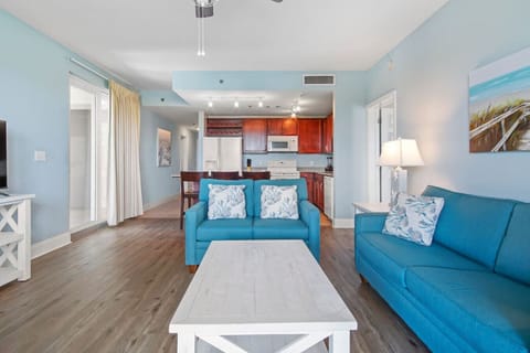 Lakefront Living Area with Flat Screen TV, Sleeper Sofa and Private Balcony Access