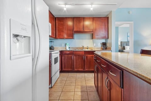 Fully Stocked Kitchen with Lake Views and Island Bar Seating
