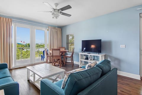 Lakefront Living Area with Flat Screen TV, Sleeper Sofa and Private Balcony Access