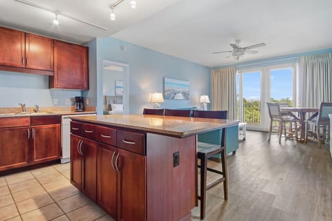 Fully Stocked Kitchen with Lake Views and Island Bar Seating