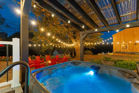 Soak your cares away in the 7 person hot tub just steps outside the school, overlooking the yard, barn and field.