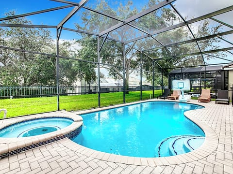 Enjoy our semi-private pool and enclosed lanai with a quite park-like setting