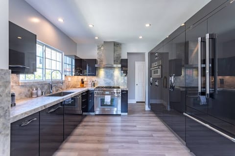 Designer Kitchen w Thermador Stove/Oven, Subzero Refrigerator/Freezer w Ice Maker, and Microwave