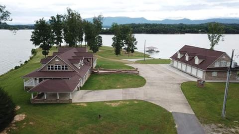 This beautiful lake house awaits you! With your own private boat ramp & dock!