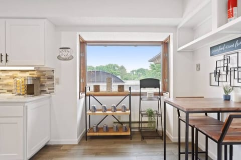 Begin your day in the bright, inviting kitchen, where every cup of coffee is brewed to perfection.