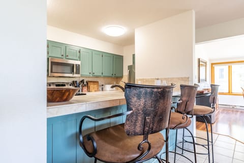 Breakfast bar with seating for three.