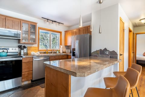 Breakfast bar offering seating for three.