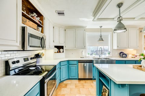 Fully equipped kitchen with stainless steel appliances