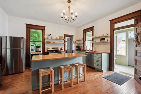 Full stocked kitchen with island seating