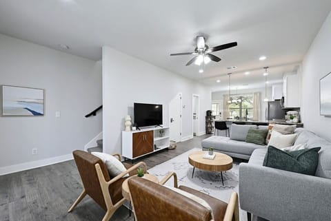 Enjoy easy together time at Hogan Hideaway—an open floor plan that keeps the living room, kitchen, and dining all connected.
