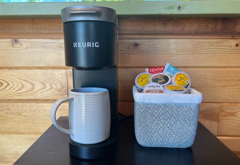 A K-mini-Keurig, a variety of coffees and creamer or just heat up some water for a cup of tea. Start your day off right!