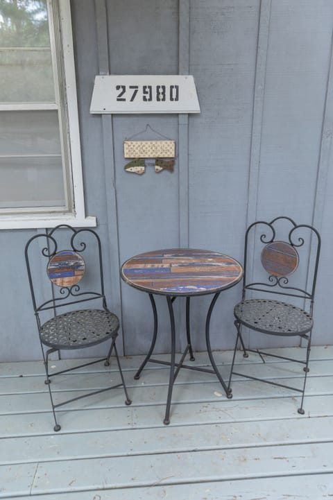 Great coffee spot on front deck for two.