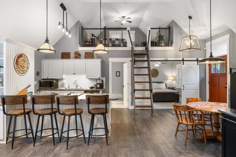 Main Living Area - A wonderful use of the space, this carriage house is the back part of the main home.  It has it's own private entrance and parking and is locked off from the main home.
