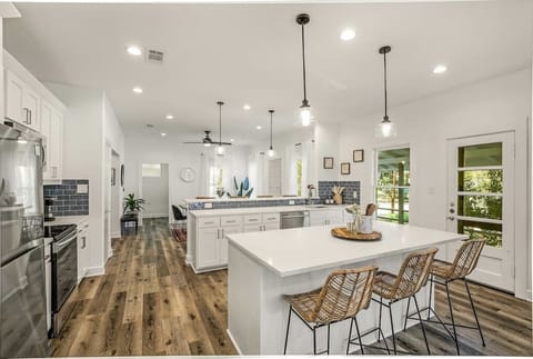 2 Islands w/ Bar Height Seating