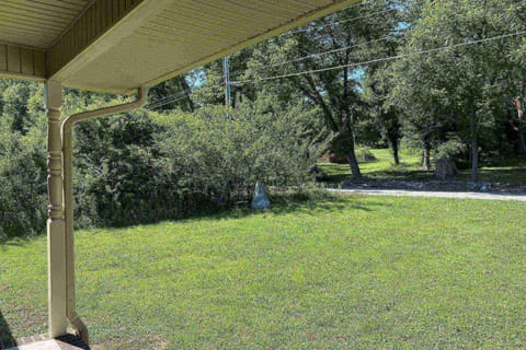 Enjoy the covered front porch and level front yard on a quiet dead-end street