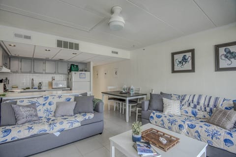 Living  Area and View of Dining Table and Kitchen