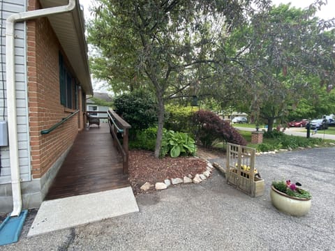 Off street parking and the wrap around porch leading you to a private entrance 