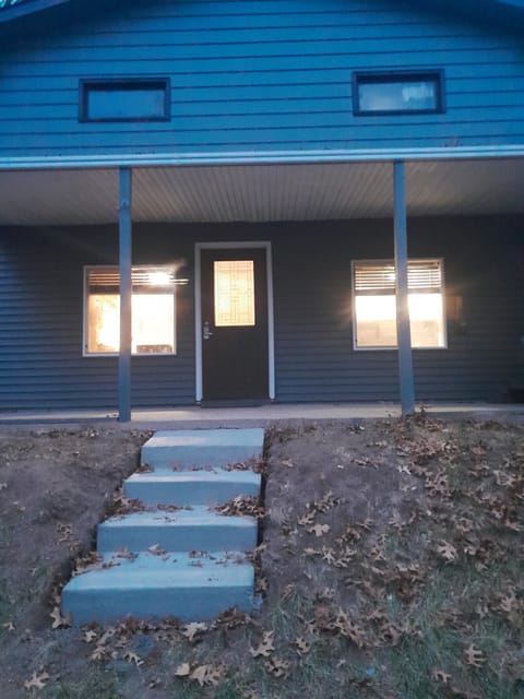 View of Airbnb door from hot tub
