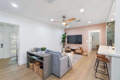 Open floor plan that has been professionally decorated.  65" Large screen TVs throughout the home.