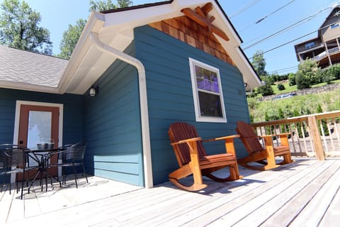 Upper side deck, lounge and take in the sun, relax while you BBQ.