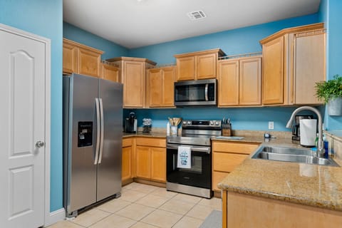 Fully stocked kitchen and brand new propane grill outside to cook your catch