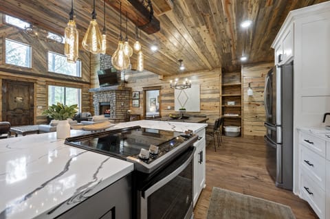 "This isn't just a kitchen; it's a haven for culinary exploration, surrounded by the enchantment of the cabin's surroundings."