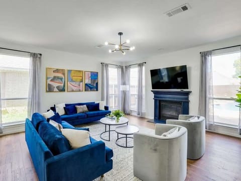 This living room is the perfect blend of sophistication and comfort - sit back, relax, and make yourself at home!