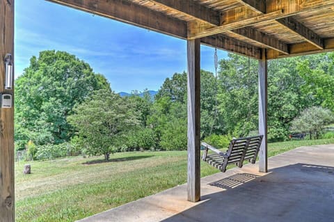 Enjoy your morning coffee viewing year round mountain views from our charming porch swing.