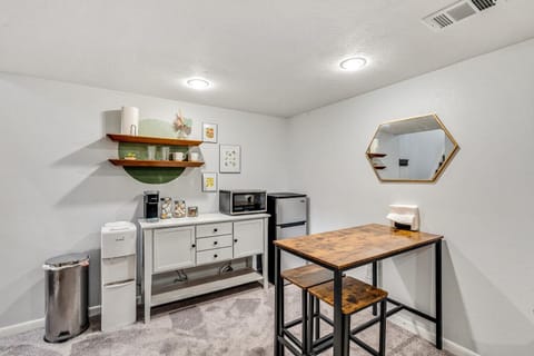 Kitchenette with fridge/freezer, microwave, Keurig, and hot/cold water dispenser