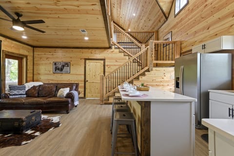 This open living space has room for everyone to hang out, watch TV, and stay connected.