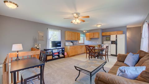 The living room and kitchen are warm, friendly and the perfect place to relax after a fun-filled day at the beach or local golf course.
